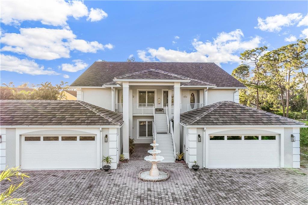 2nd floor with oversized 2 car garage and 2 dedicated parking spots