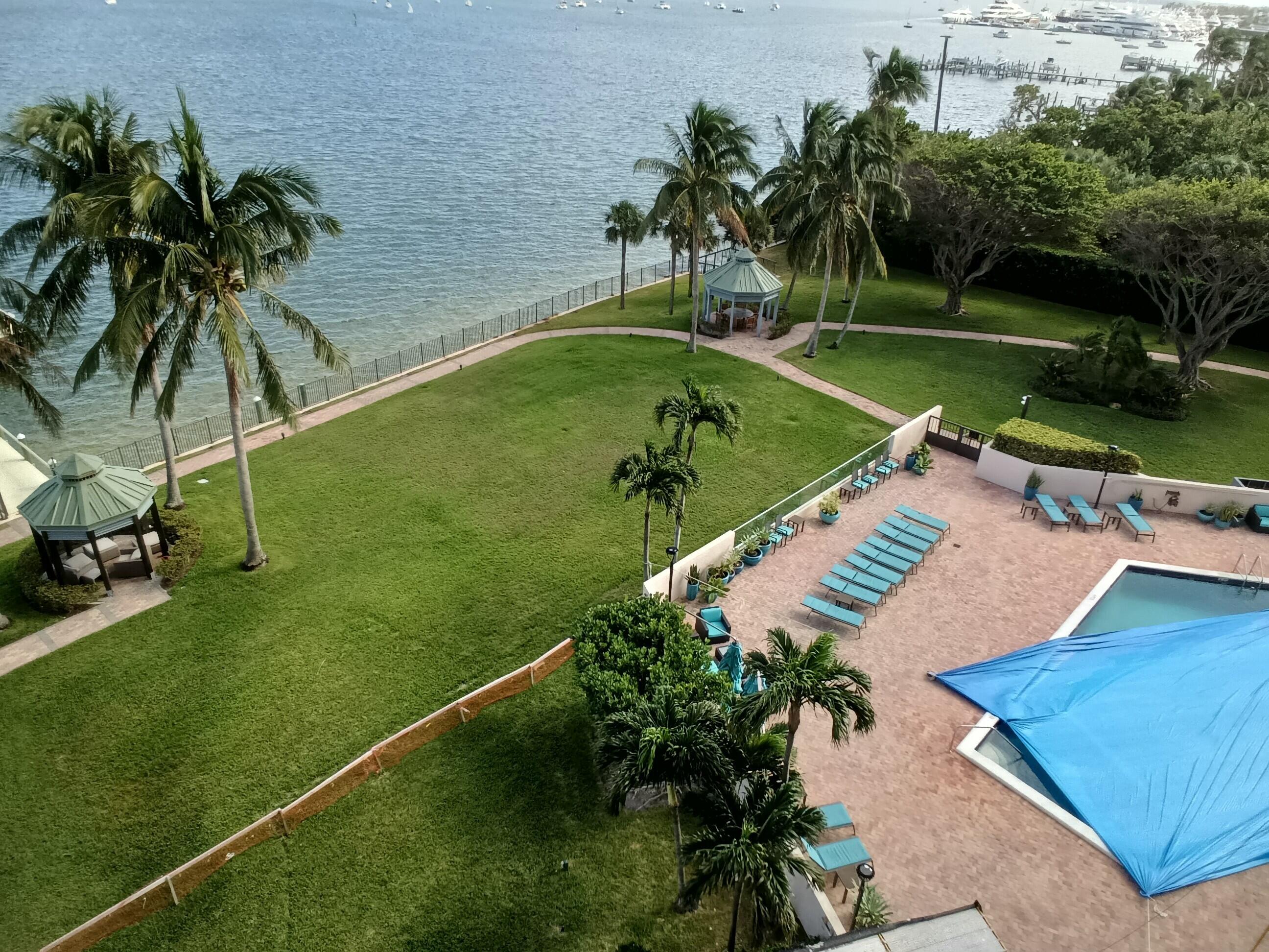 a view of a backyard with a small pool