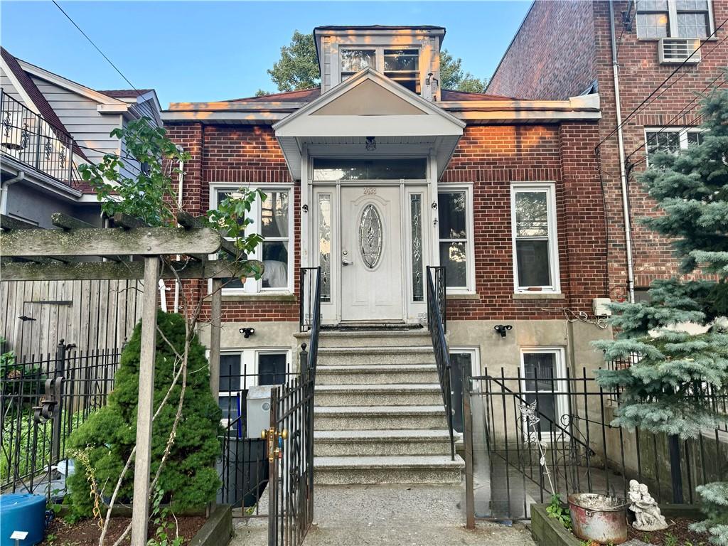 a front view of a house with a porch