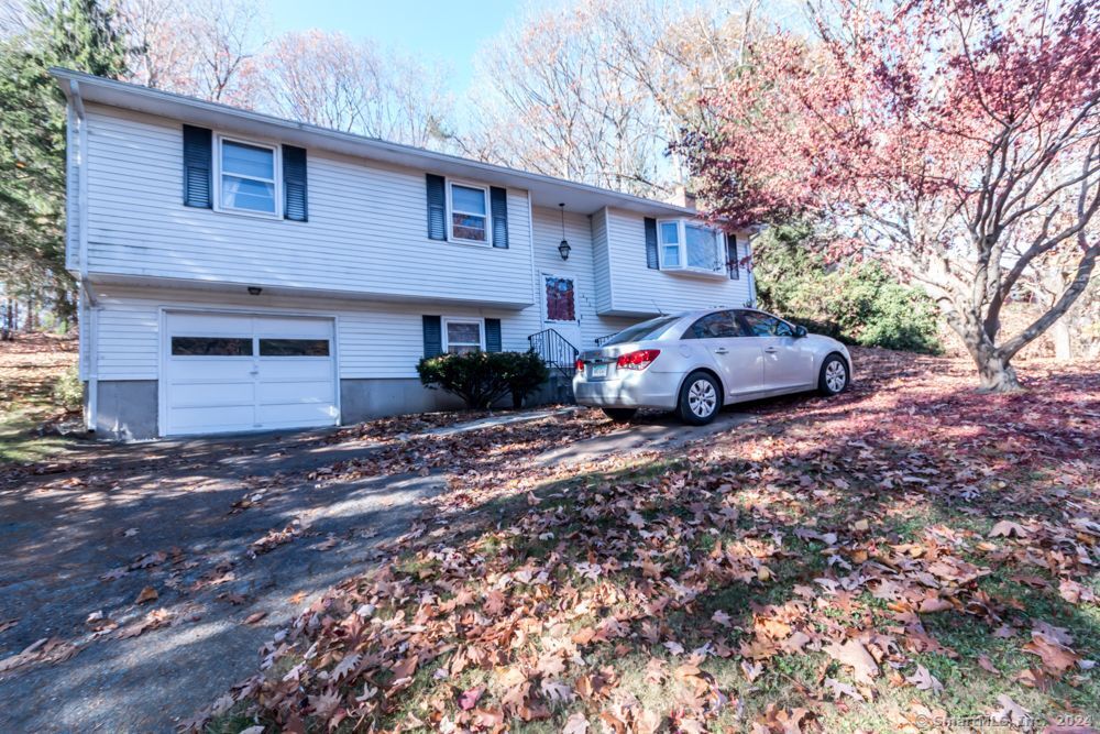 a car parked in front of a house