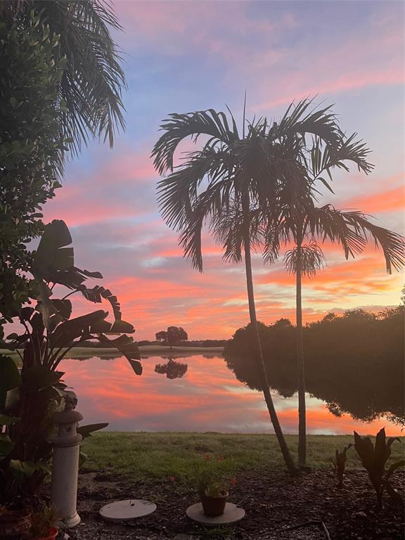 Sunrise on the private waterfront pool deck.