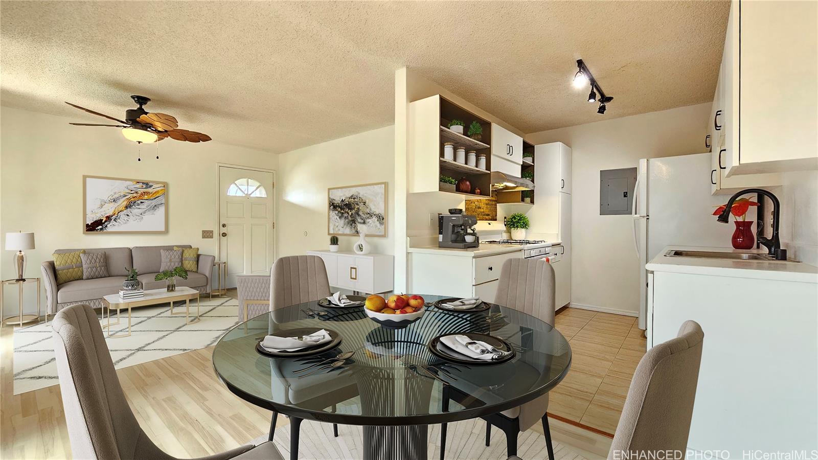 a view of a dining room with furniture and a chandelier