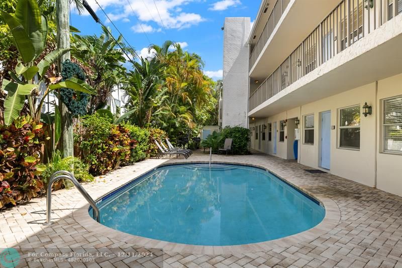 a view of outdoor space yard and swimming pool