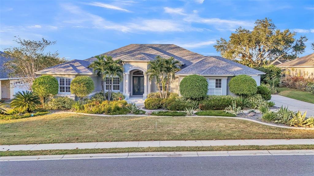 front view of a house with a yard