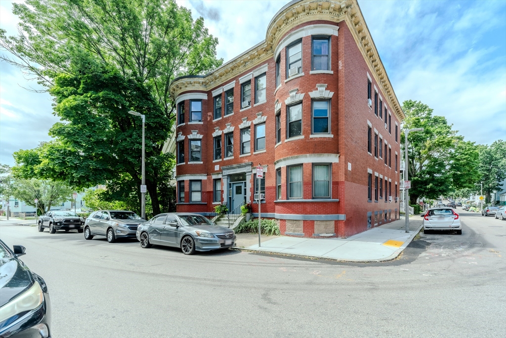 a car parked in front of a building