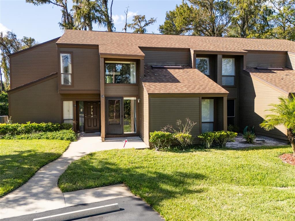 front view of a house with a yard