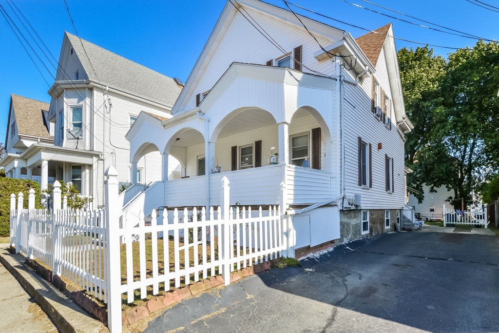 a front view of a house with a porch