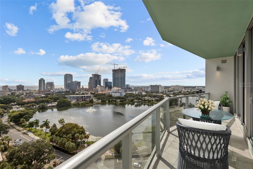 a view of a balcony with city view