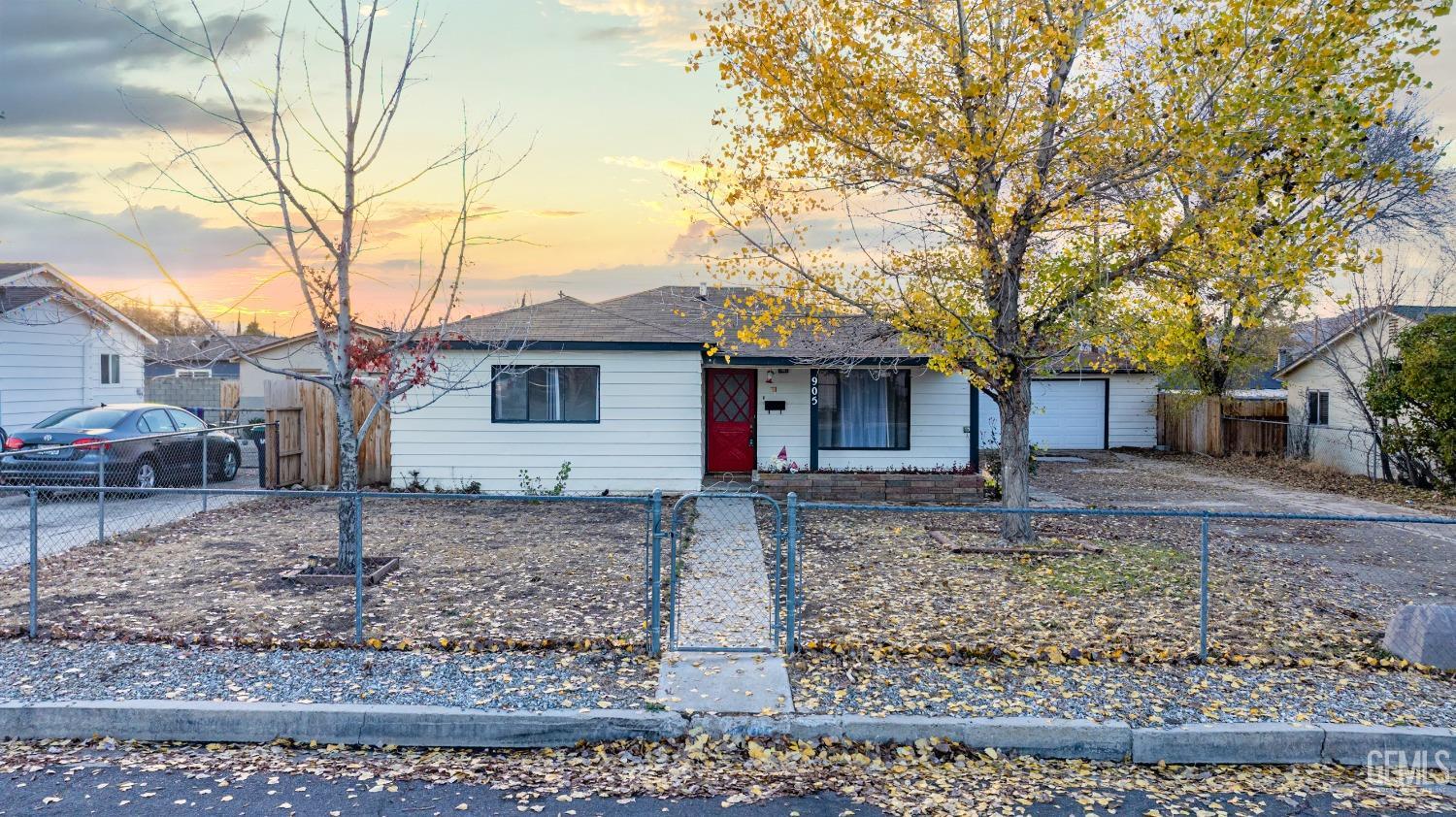 a front view of a house with garage