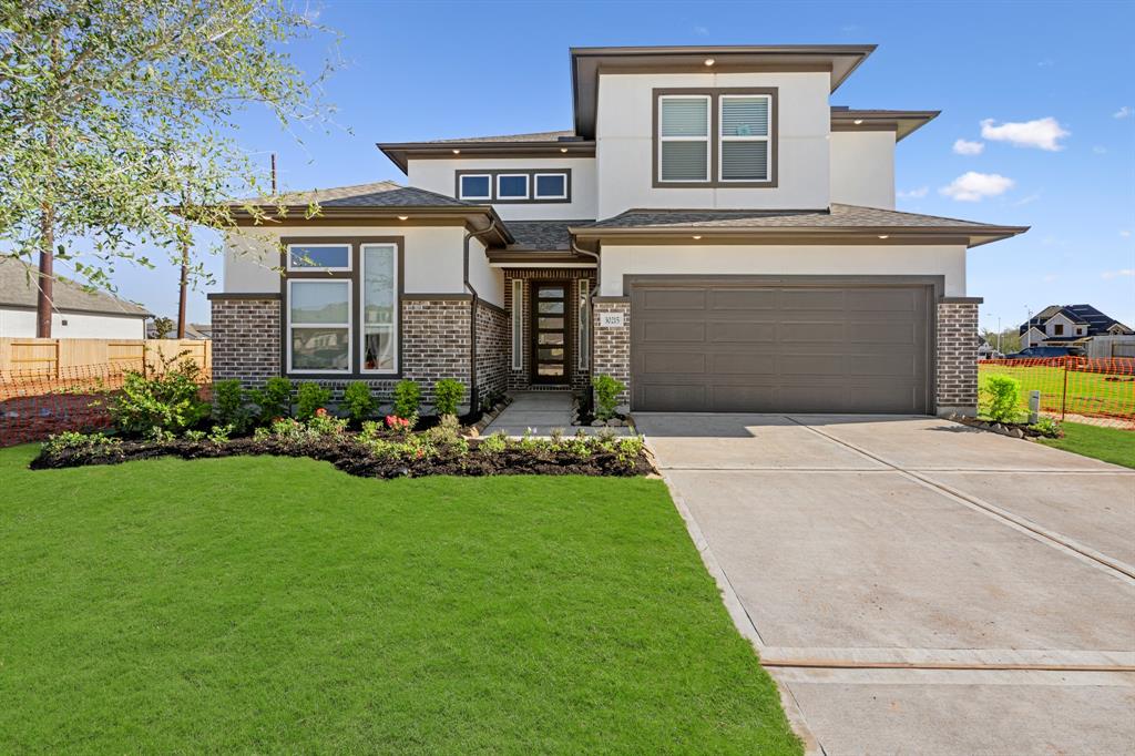 a front view of house with yard