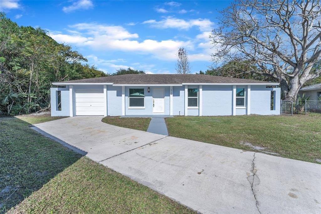 front view of house with a yard