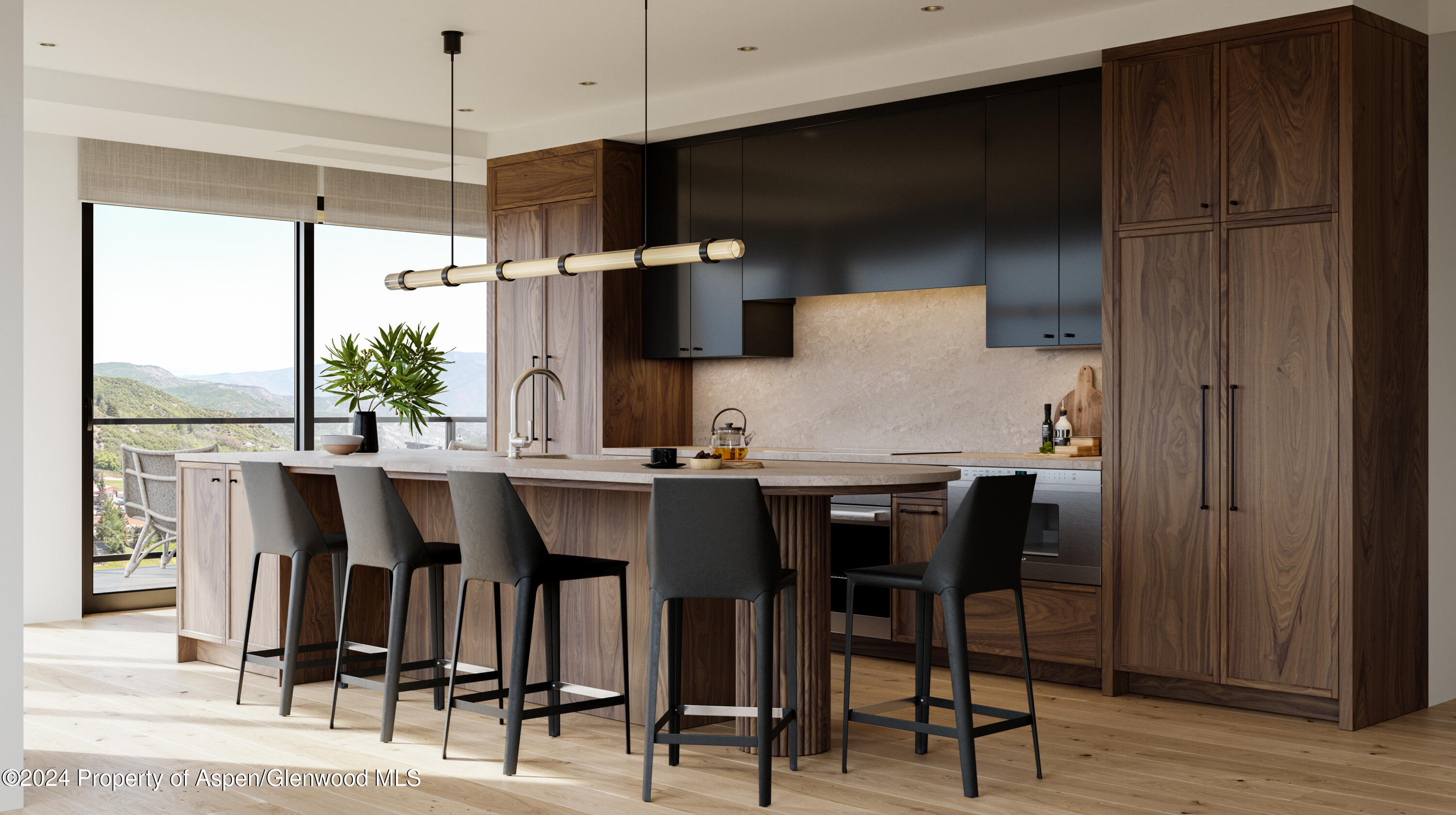 a kitchen with stainless steel appliances kitchen island granite countertop a table chairs and a refrigerator