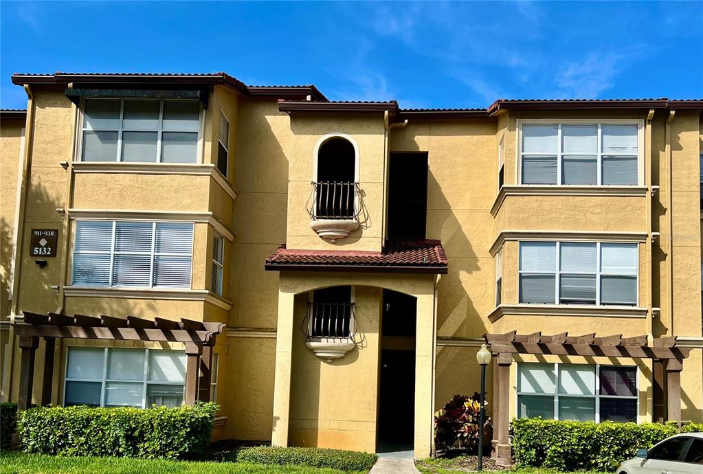 a front view of a house with a outdoor view