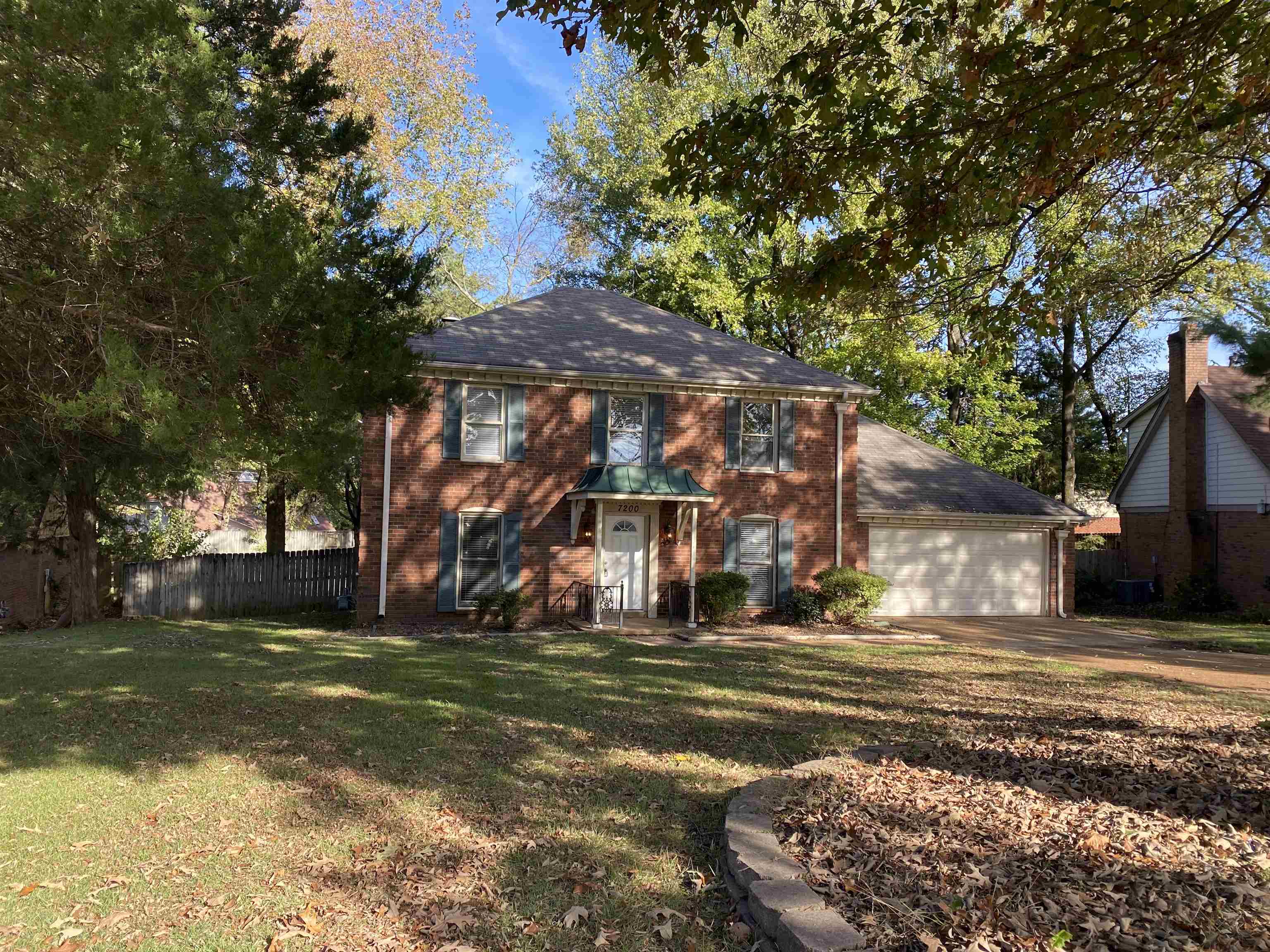 a view of a house with a big yard