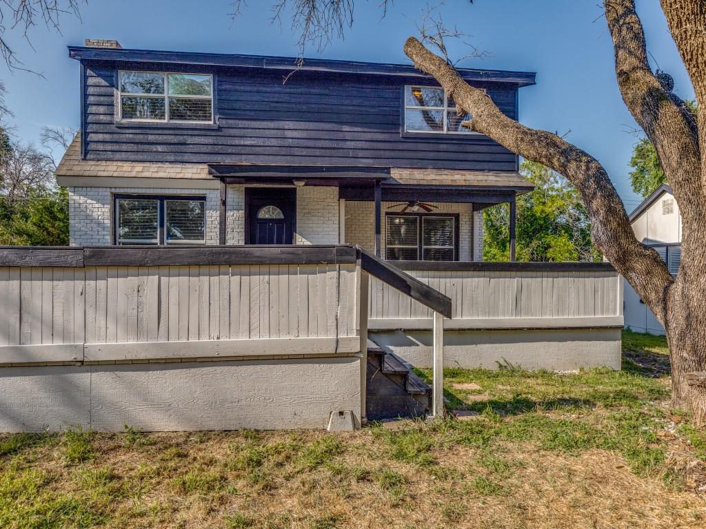 front view of a house with a small yard