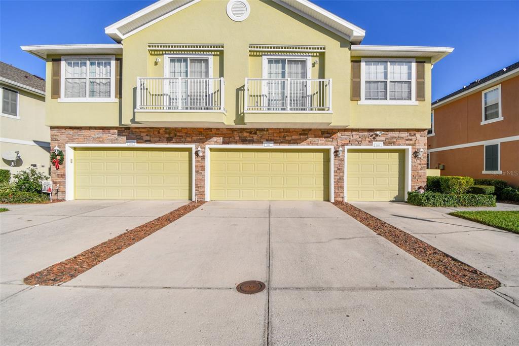 a front view of a house having yard