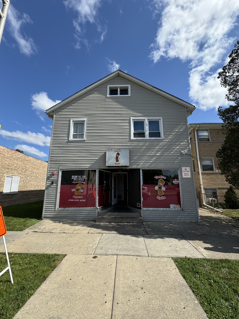 a front view of a house with a garage