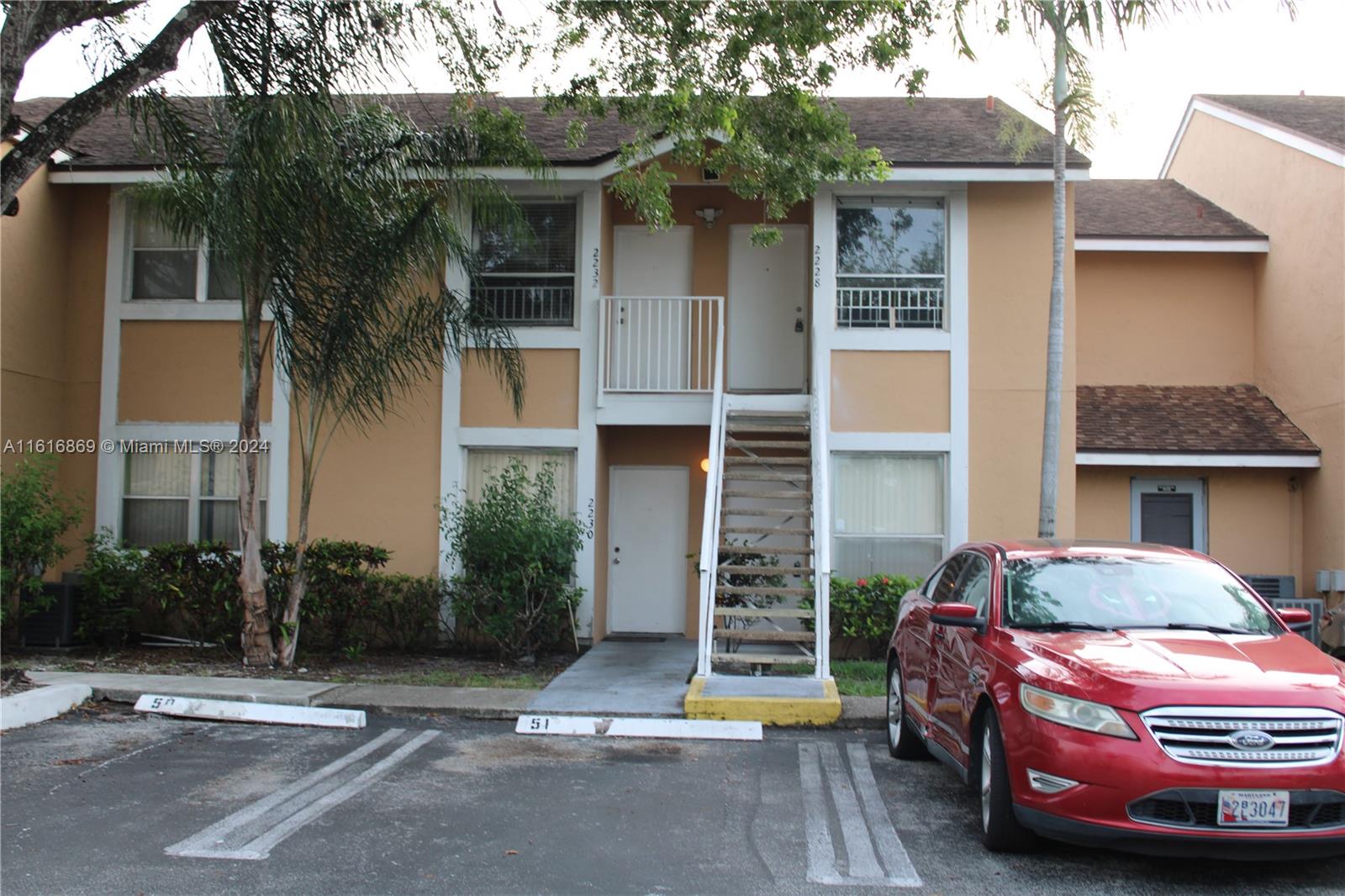 a front view of a house with balcony