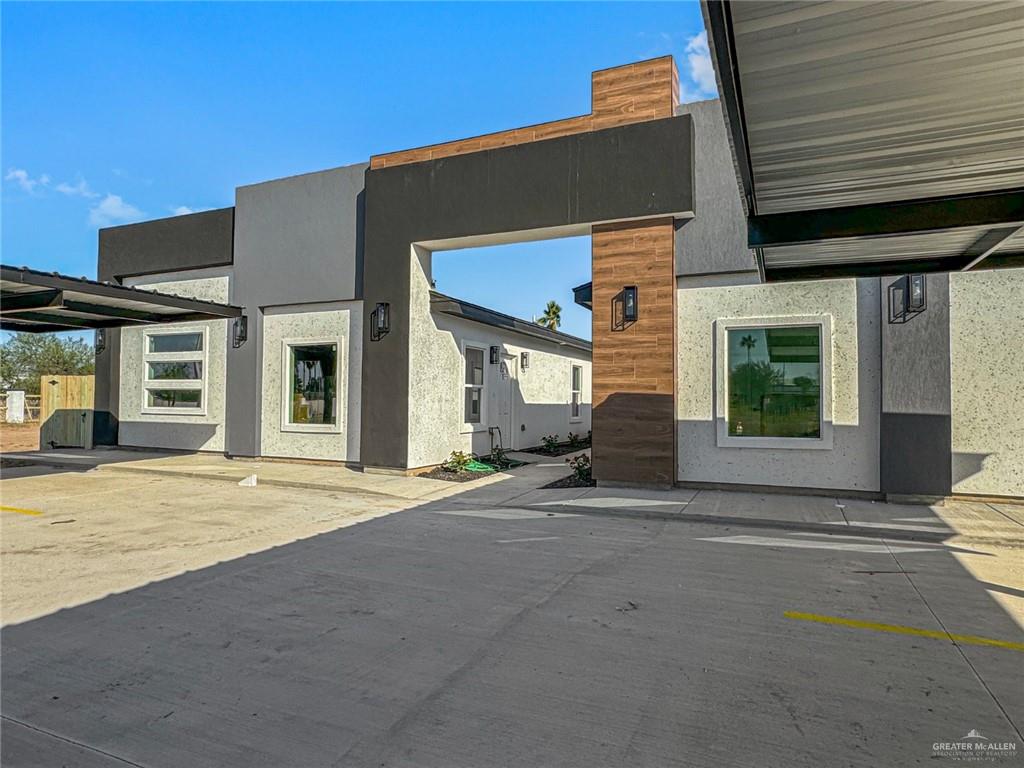 a view of a house with a patio