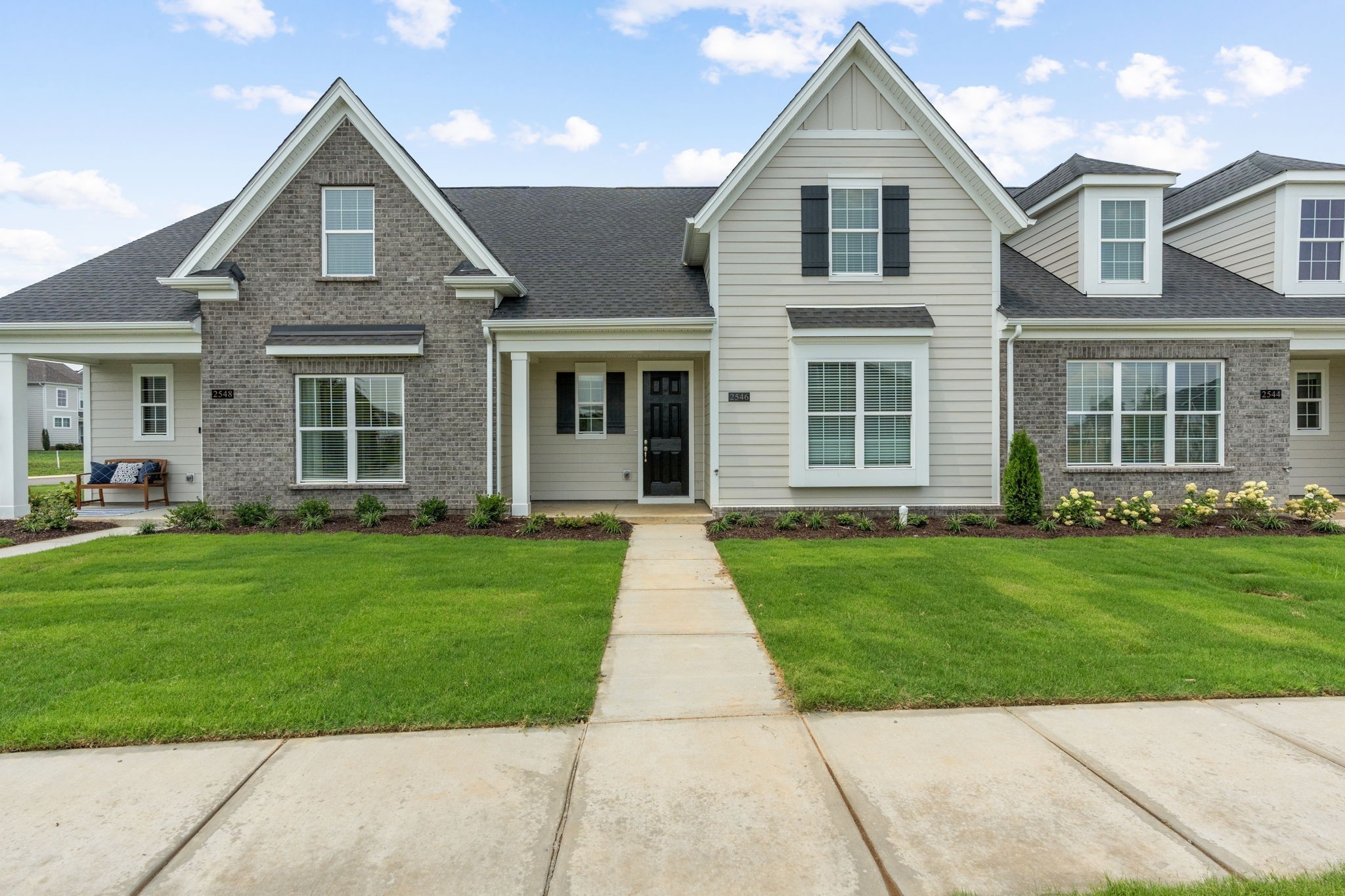 front view of a house and a yard