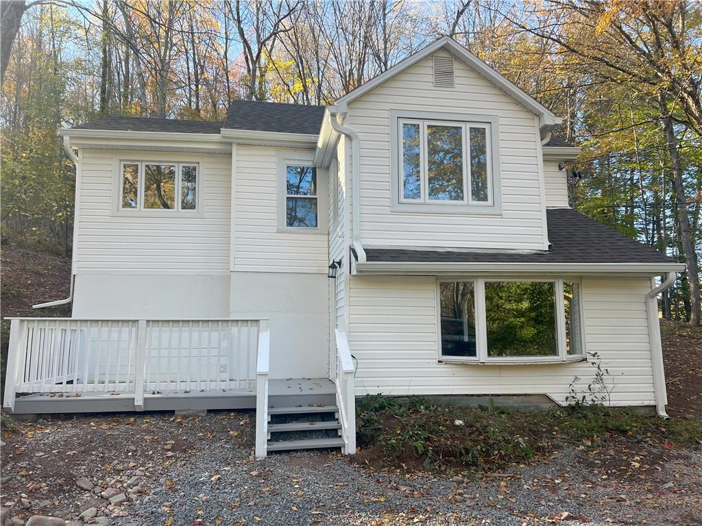 View of front facade featuring a large deck