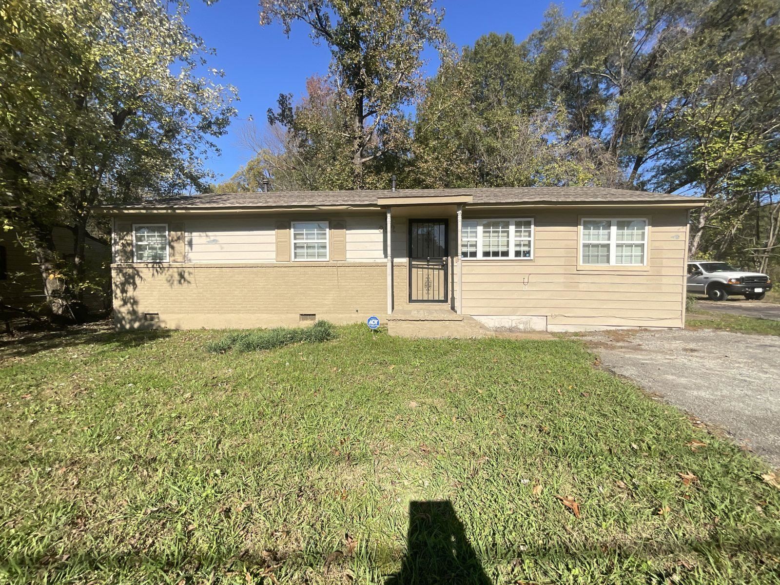 front view of house with a yard