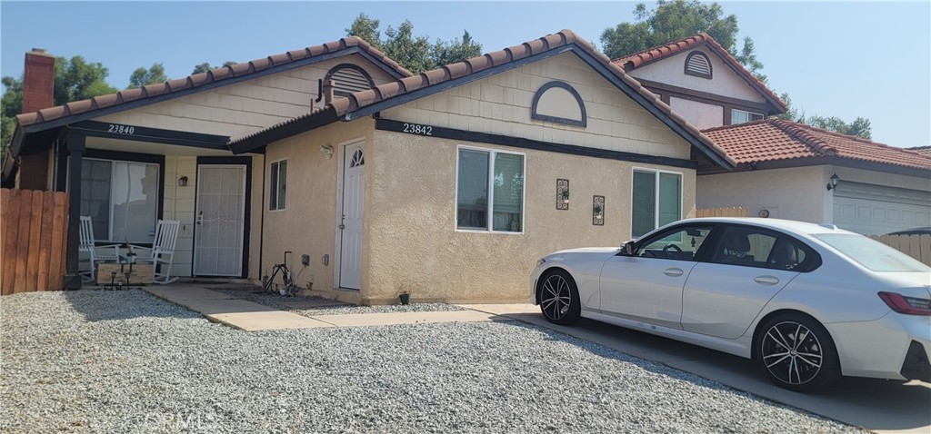 a car parked in front of a house