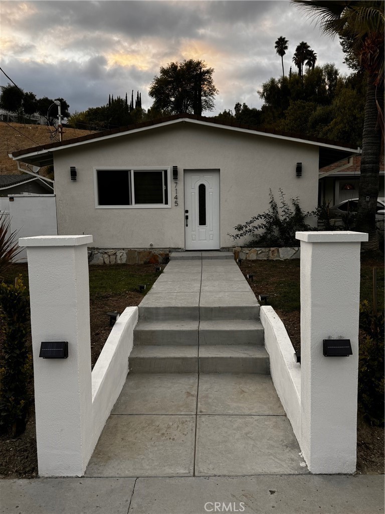 a front view of a house with entryway