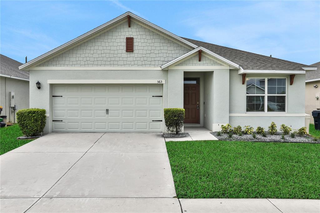 a front view of house with yard