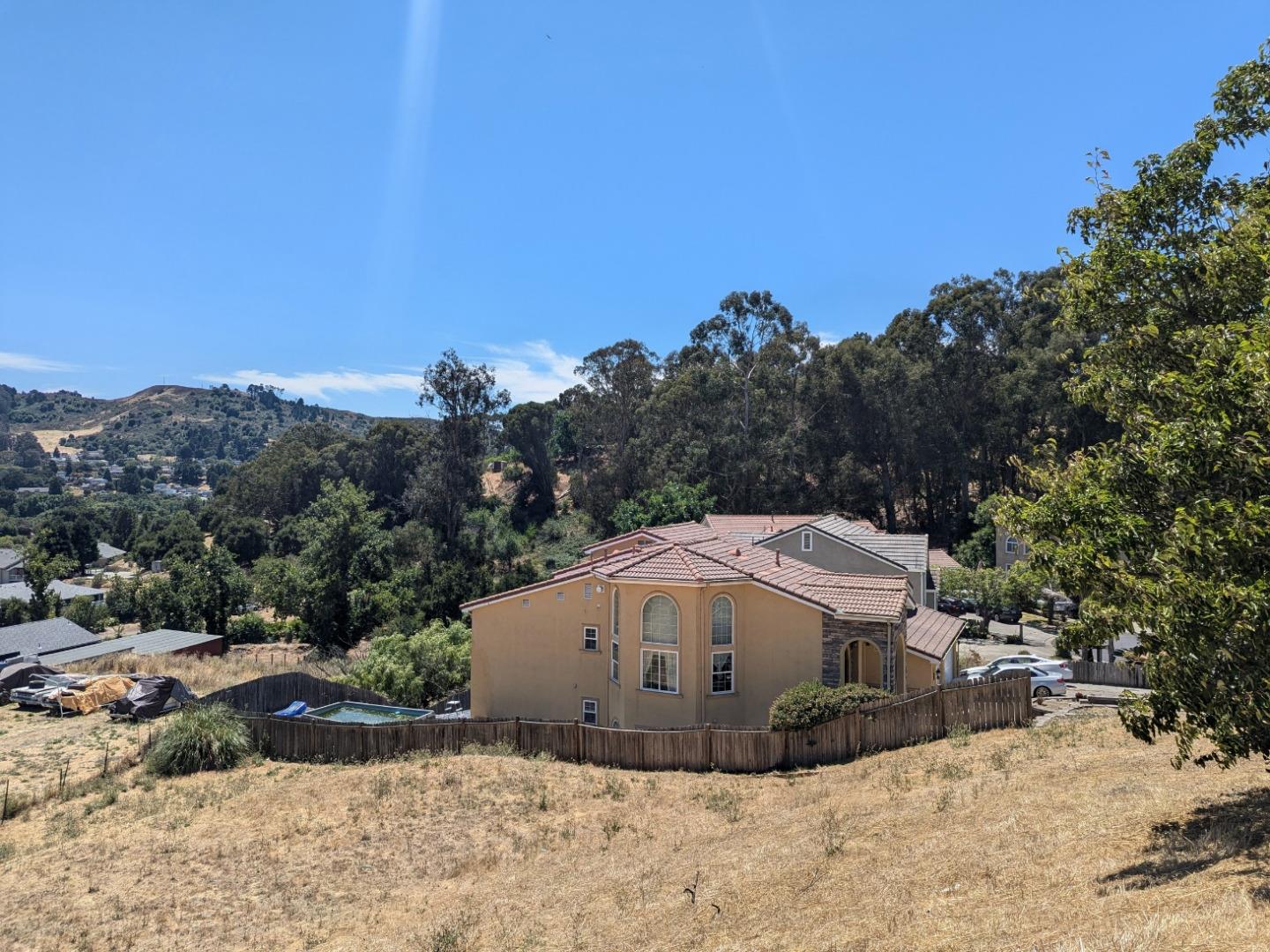 a view of a very nice looking house with a yard