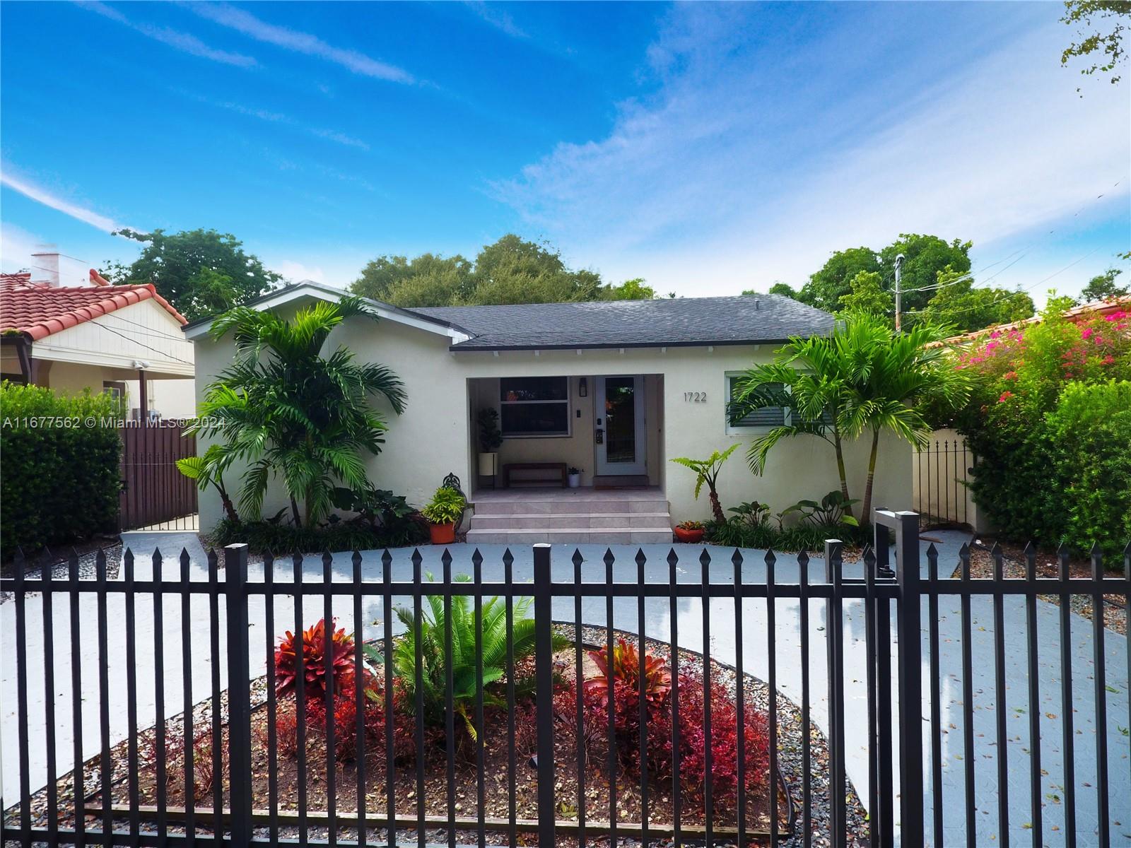 a front view of a house having yard