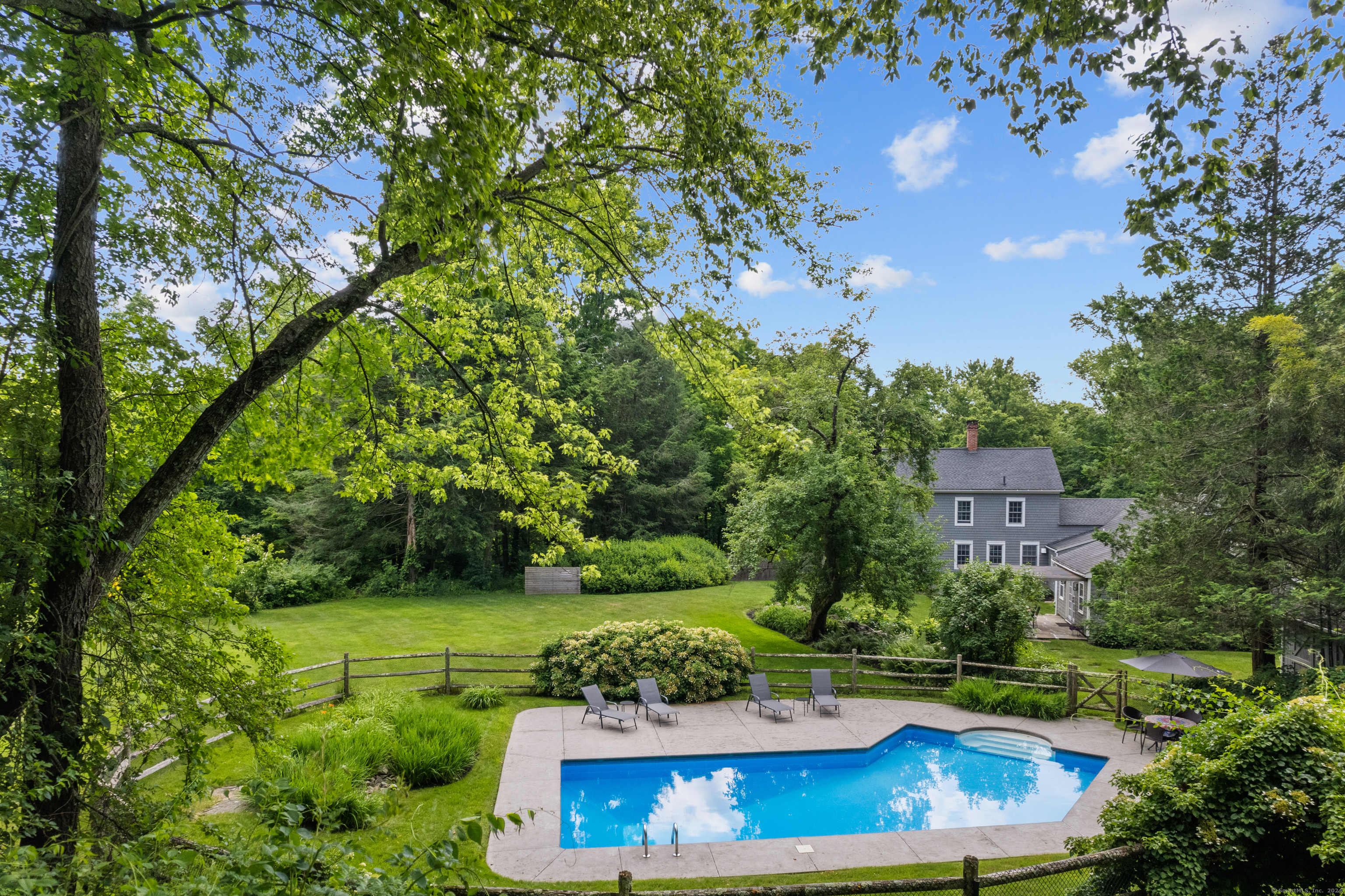 Pool with house in background