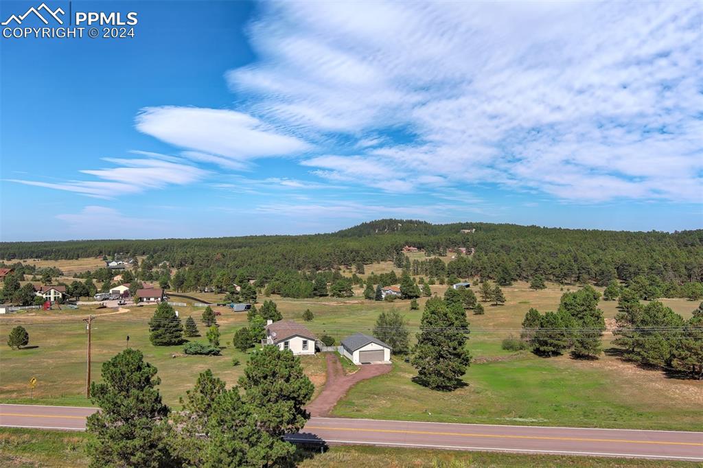 Property view of mountains with a rural view