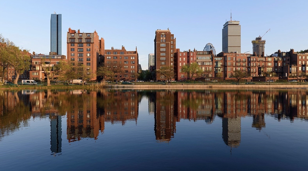 a view of a city with tall buildings