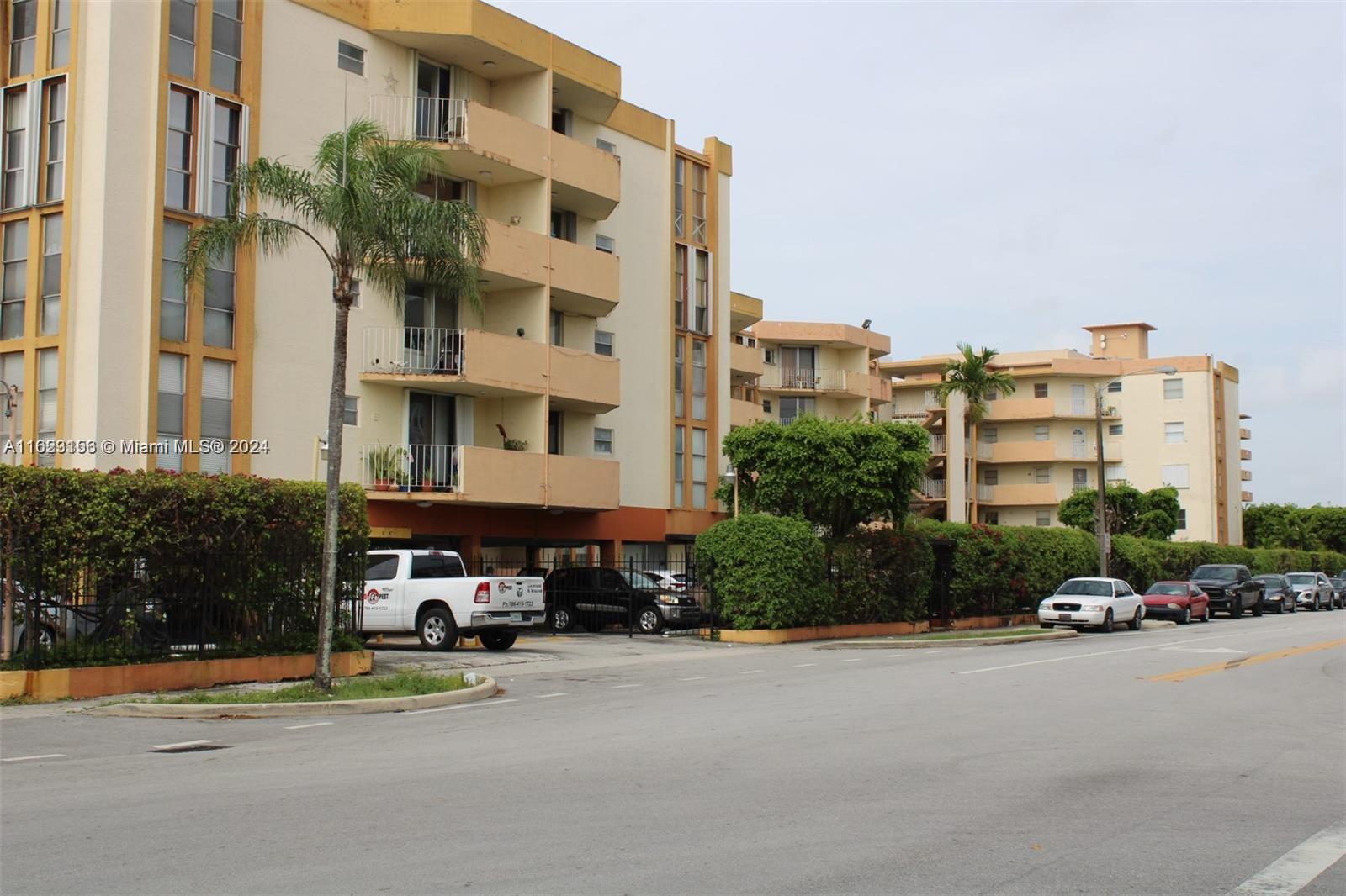 a front view of a building with street view