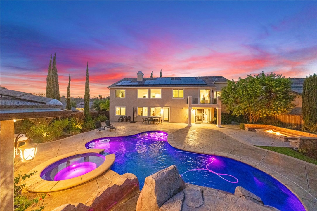 a view of a patio with swimming pool