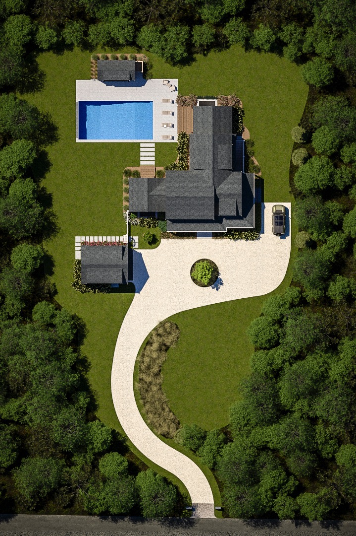 an aerial view of a house with a swimming pool