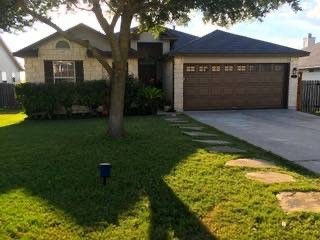 a front view of house with yard