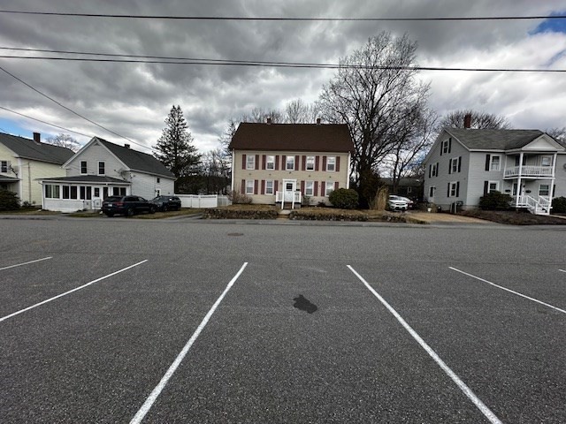 a view of a city street with a building