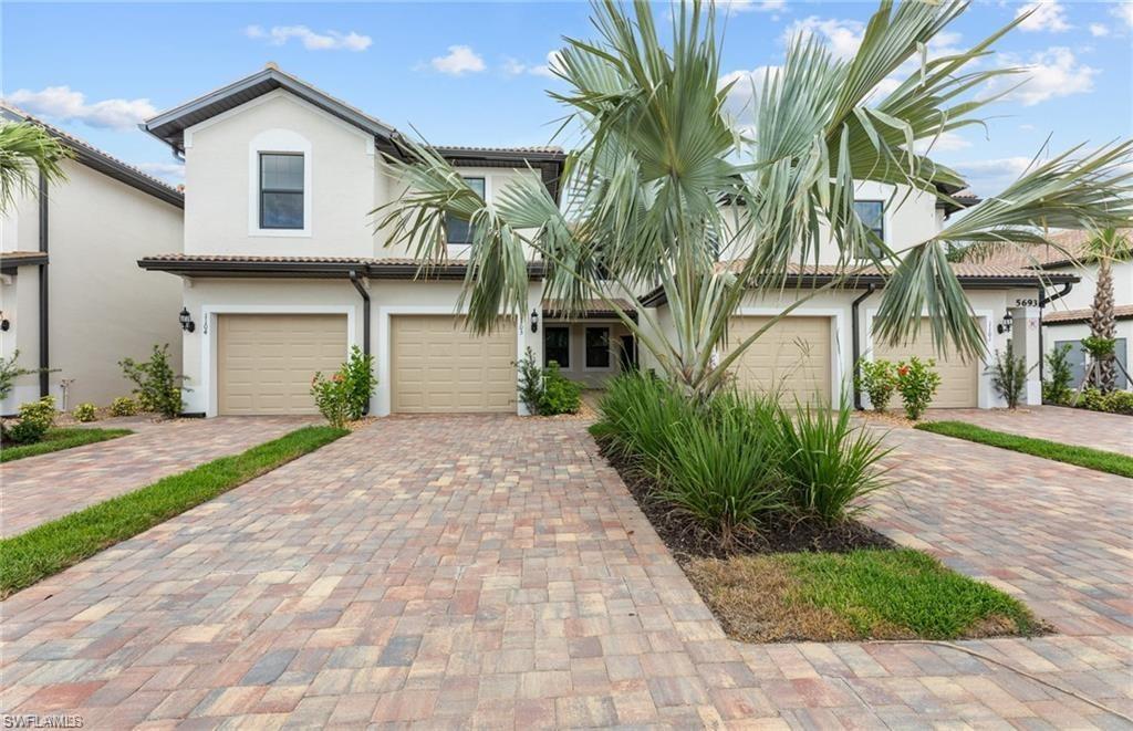 View of front of property with a garage