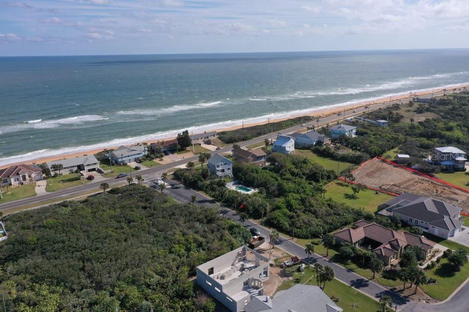 a view of a city with an ocean