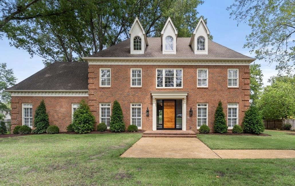 Colonial house with a front lawn