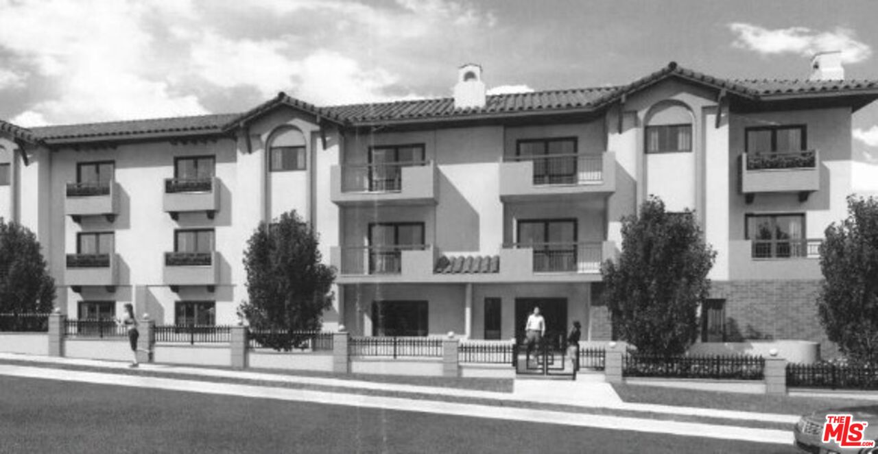 a front view of a house with a outdoor space