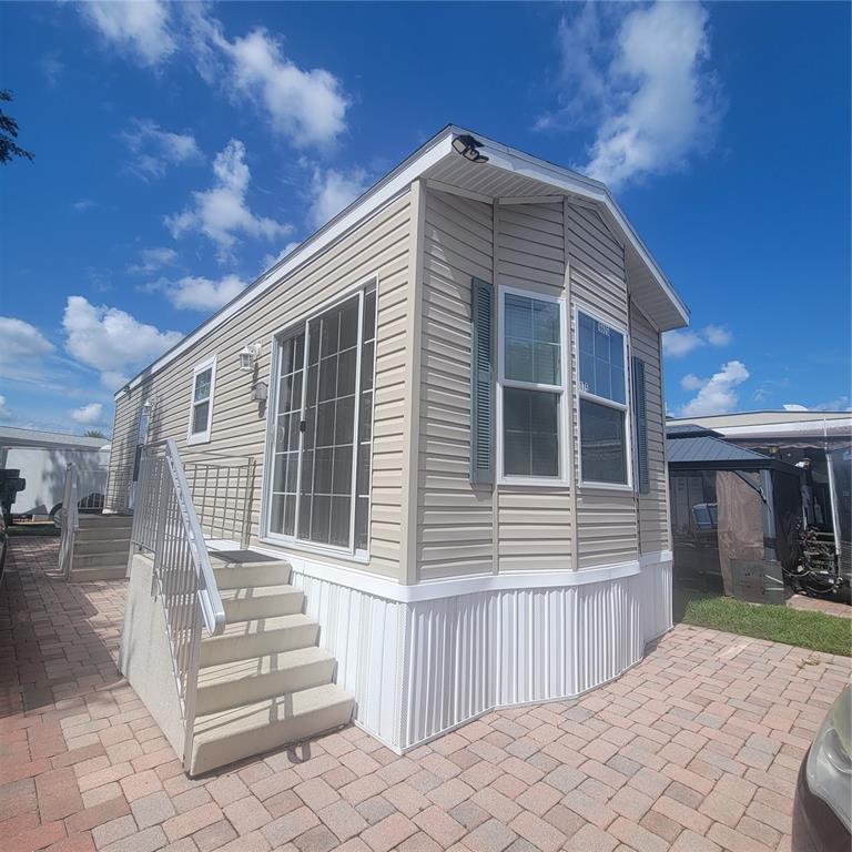 a front view of a house with a porch