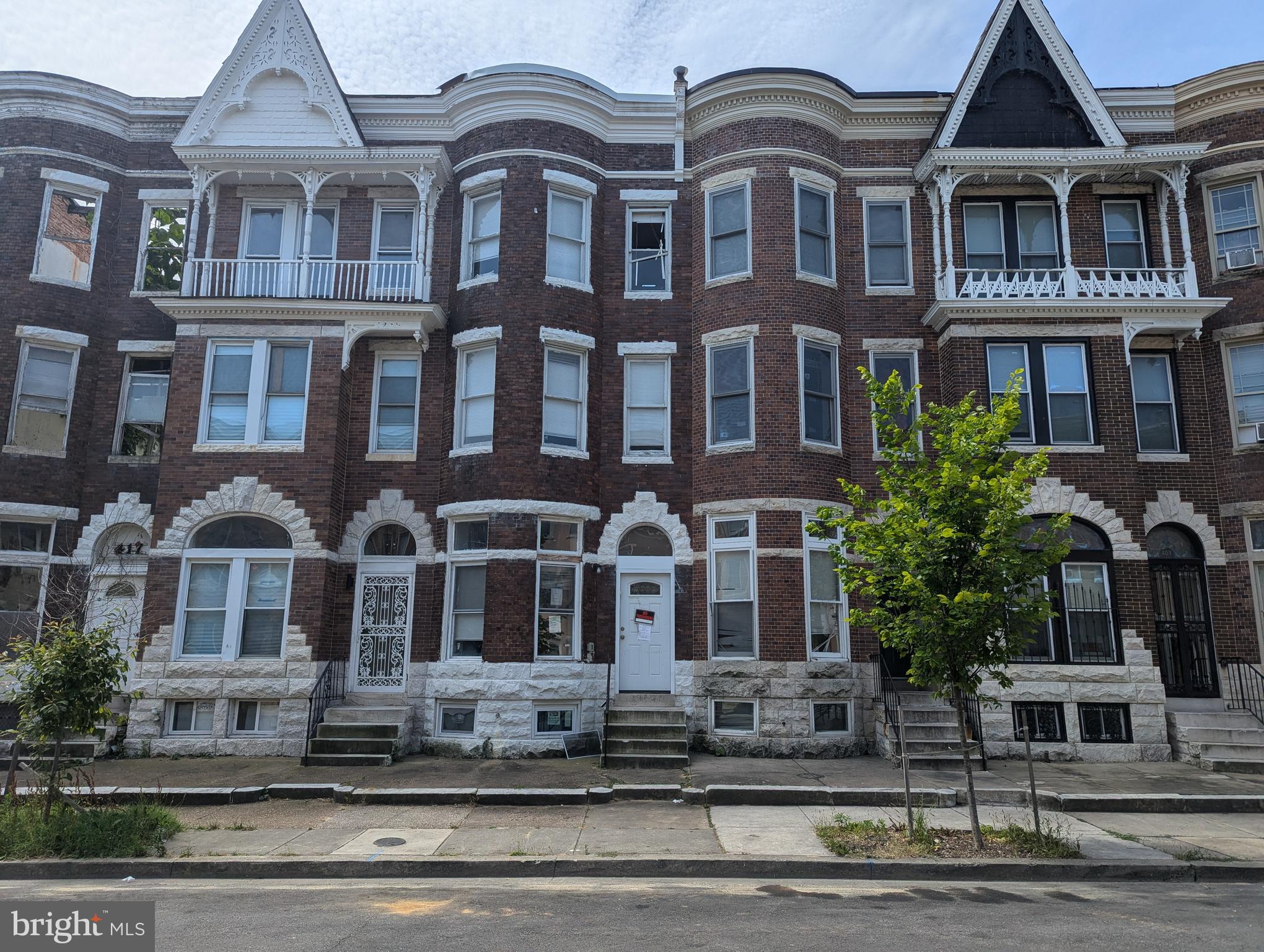 a front view of a multi story residential apartment building