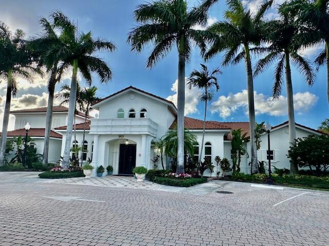 front view of a house with a garden