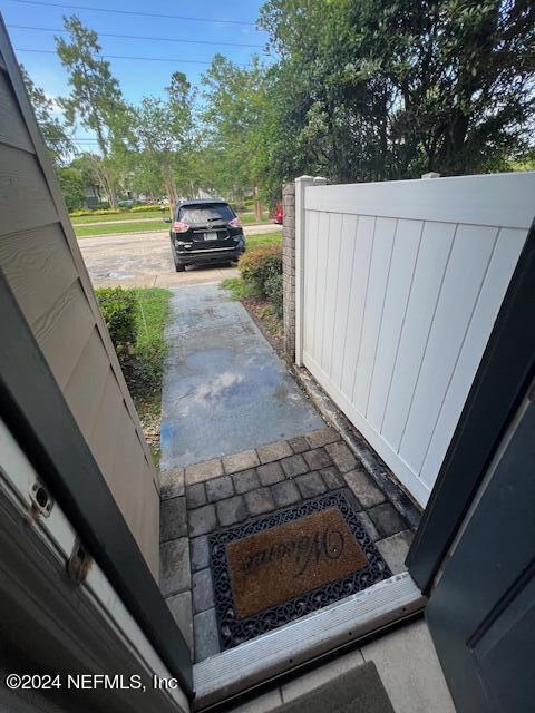 a view of a yard from a balcony