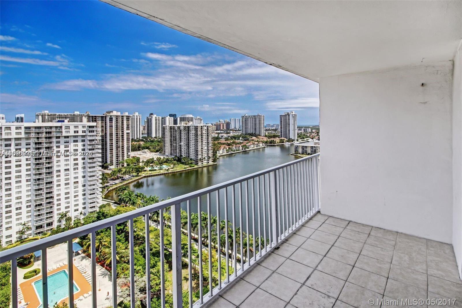 a view of a balcony with city view