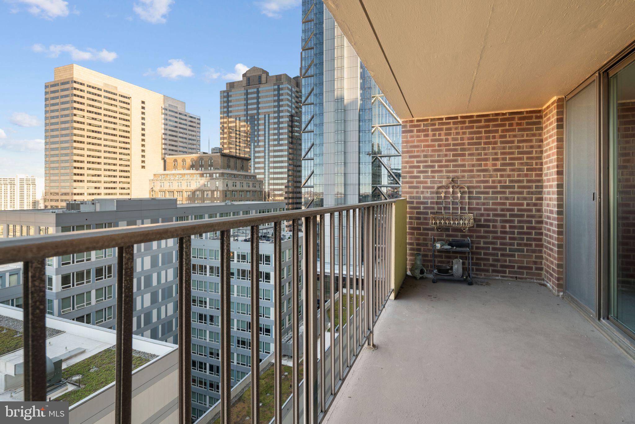 a view of a balcony with city view