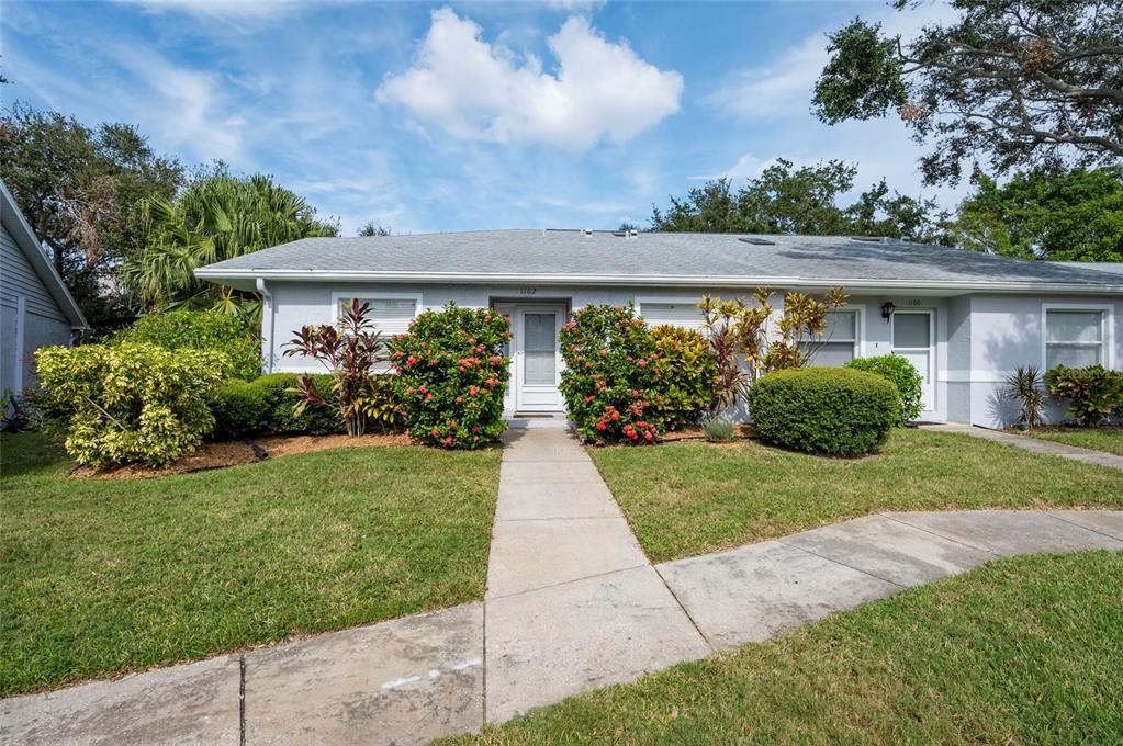 front view of house with a yard